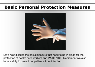 A person 's hand is shown with gloves on.
